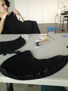 Hand stitching sections of our beautiful magpie head pieces 
