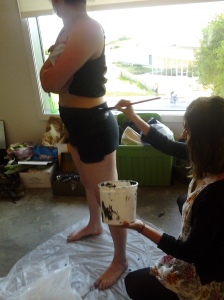 Painting latex onto our raven shorts