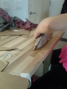 Marina constructing a raven beak 
